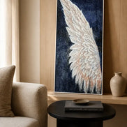 Emberwing Diamond Painting featuring a radiant wing with warm colors under soft lighting.