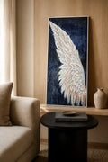 Emberwing Diamond Painting featuring a radiant wing with warm colors under soft lighting.