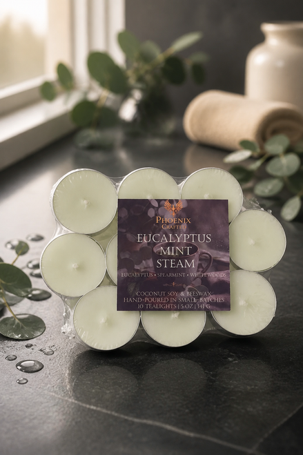 Pack of ten Eucalyptus Mint Steam tealights styled with eucalyptus leaves, mint, and cooling spa-inspired botanicals.