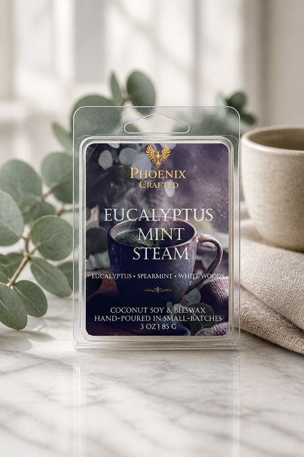 Eucalyptus Mint Steam wax melts in Phoenix Crafted packaging styled with eucalyptus, mint, and rain-washed spa botanicals.