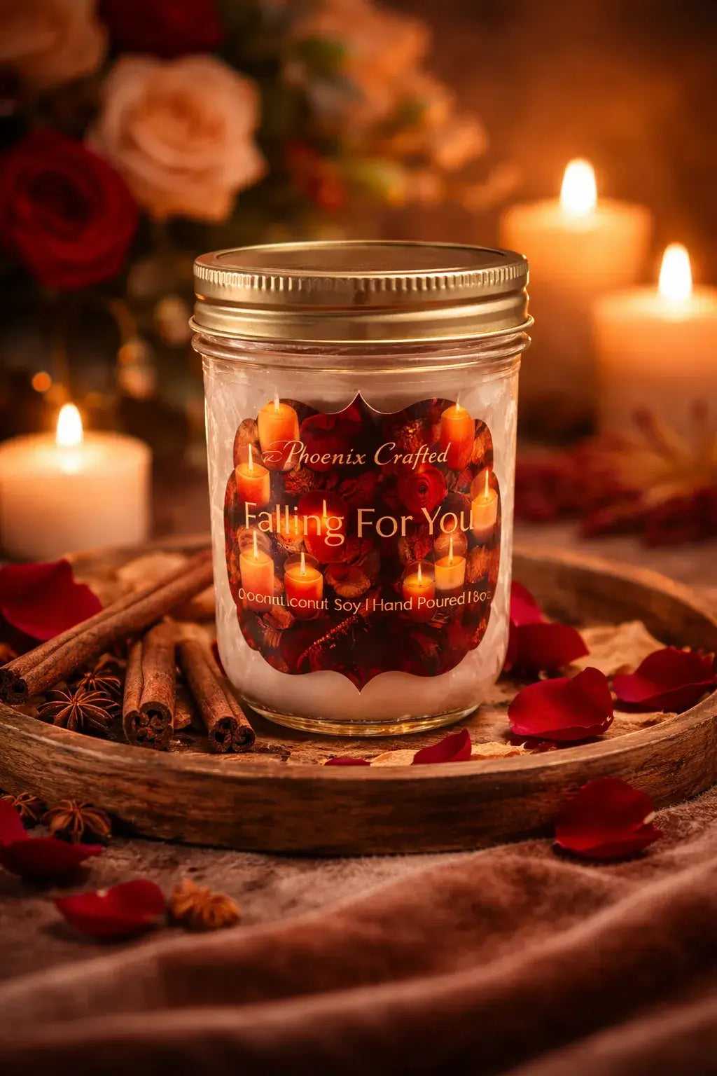 Falling For You Candle in a glass jar surrounded by rose petals and candles, creating a romantic autumn ambiance.
