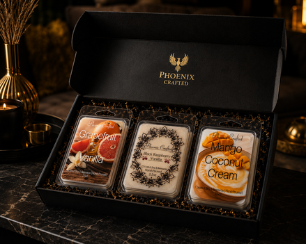 Grapefruit & Vanilla, Mango Coconut Cream, and Black Raspberry Vanilla wax melts arranged together as the Fruity Gourmand discovery set.
