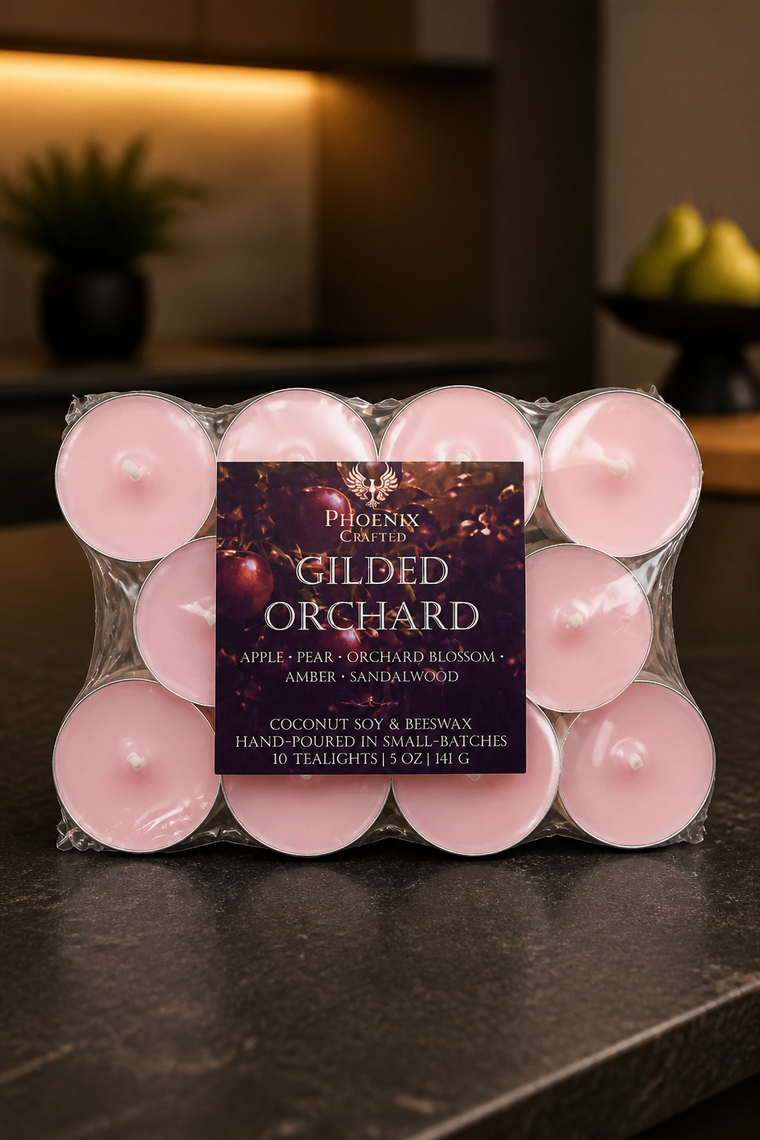 Pack of ten pale pink tealights in a clear plastic tray with visible wicks.