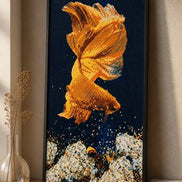 Golden Tide Betta finished diamond artwork shown in a styled black-frame mockup; artwork is sold unframed.