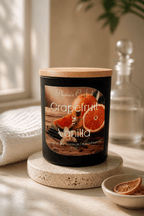 Grapefruit & Vanilla Candle, a grapefruit vanilla scented candle, displayed with natural decor and warm lighting.