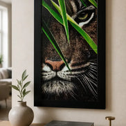 Hidden Tiger Diamond Painting displayed in a black frame, featuring a close-up of a tiger's face with vibrant details.