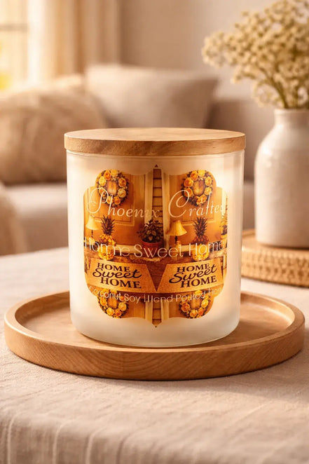 Frosted glass jar candle with flat wooden lid and visible "Home Sweet Home" label, placed on a round wooden tray in warm-lit living room.