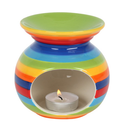 Rainbow Wax Melt Essential Oil Burner Warmer with colorful stripes and a lit tea light candle inside.