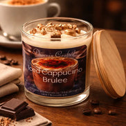 Iced Cappuccino Brûlée Candle in a glass jar with a wooden lid, surrounded by coffee beans and chocolate.