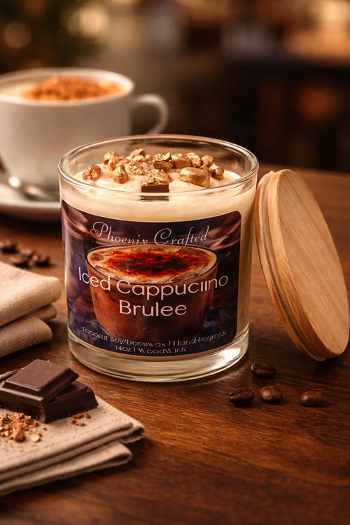 Iced Cappuccino Brûlée Candle in a glass jar with a wooden lid, surrounded by coffee beans and chocolate.