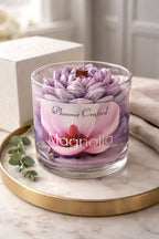 Magnolia Candle in a glass jar with floral design, perfect for creating a calm and elegant atmosphere.