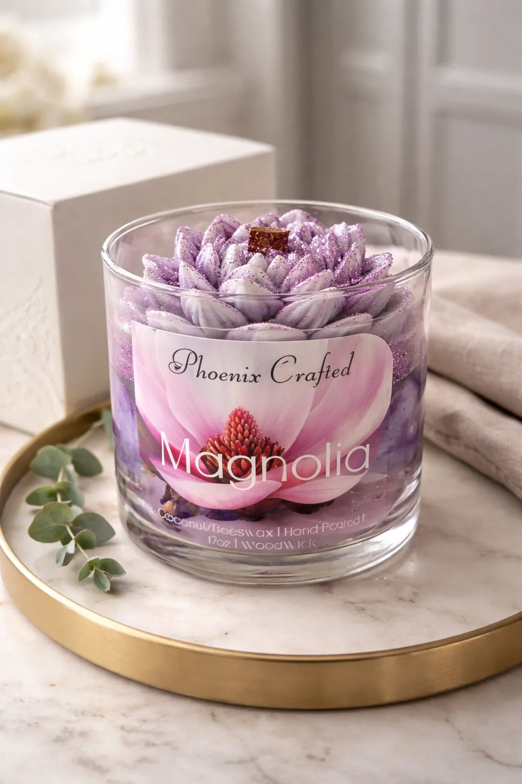 Magnolia Candle in a glass jar with floral design, perfect for creating a calm and elegant atmosphere.