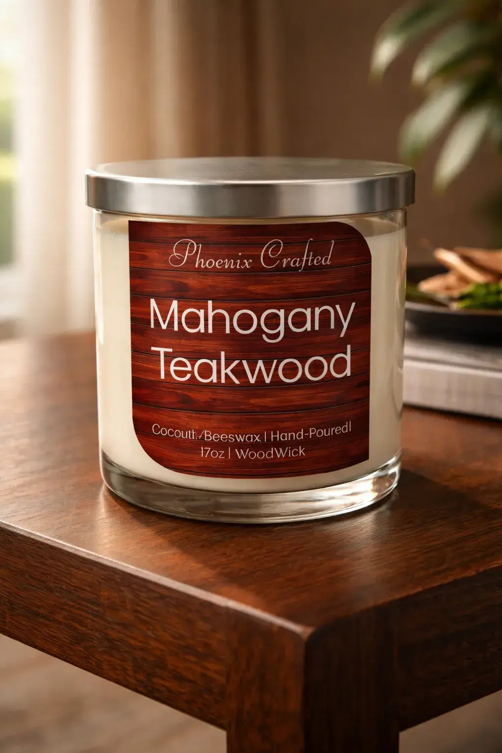Clear glass jar candle with silver metal lid and cream wax; wood-grain label reading 
