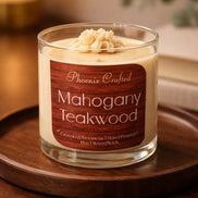 Glass jar candle with cream-colored wax and piped topper labeled 