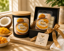Mango Coconut Cream candle and matching wax melts arranged together as a coordinated Phoenix Crafted gift set.