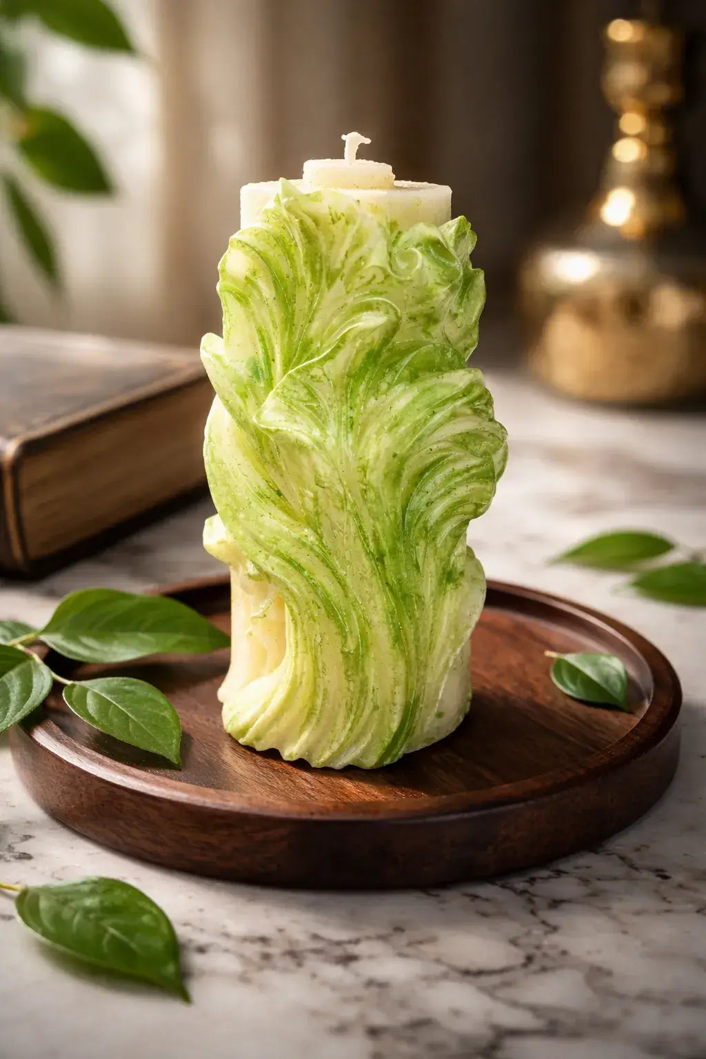 Decorative Naked Berry Candles with vibrant green swirls on a wooden plate, perfect for summer decor.