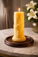 Decorative Naked Berry Candles elegantly displayed on a wooden tray, radiating warm light in a cozy setting.