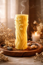 Decorative Naked Berry Candles with a playful design and warm, tropical scent on a wooden platter.