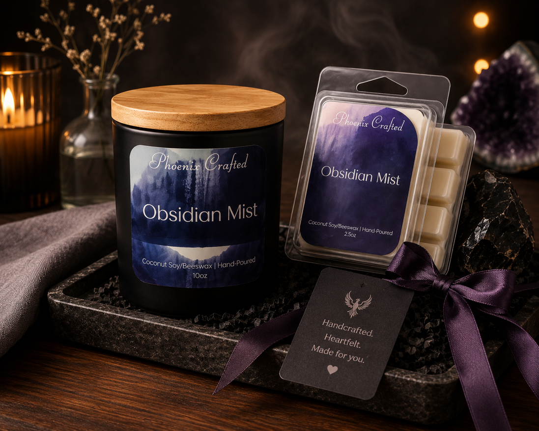 Obsidian Mist candle and matching wax melts arranged together as a coordinated Phoenix Crafted gift set.