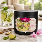 Orchid Mojito Candle in a stylish container surrounded by fresh mint and lime, ideal for tropical ambiance.