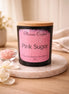 Black Pink Sugar candle jar with a wooden lid and pink Phoenix Crafted label.