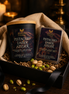 Pistachio Ember Atelier candle and matching wax melts arranged together as a Phoenix Crafted gift set.