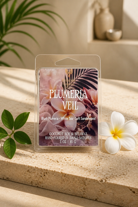 Plumeria Veil wax melts in Phoenix Crafted packaging with white tea, plumeria, jasmine, and sandalwood styling.