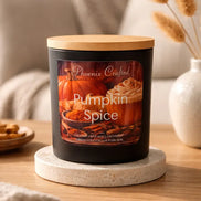 Black matte jar candle with a light wood lid and a label reading 