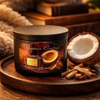 Santal & Coconut Candle in a stylish jar with coconut shell and wood accents.