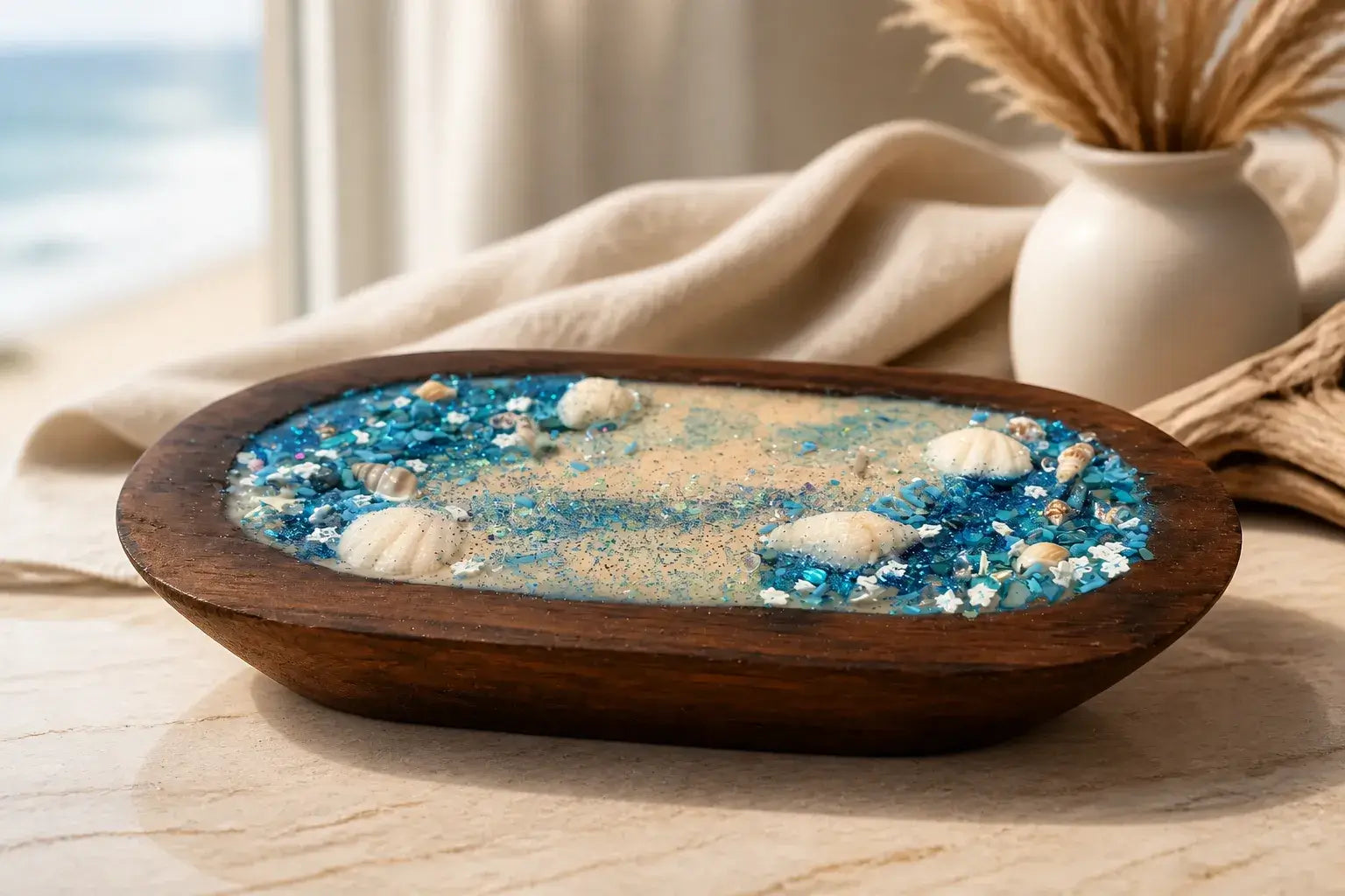 Sea Salt & Rosemary Candle displayed in a wooden tray with shells and blue crystals, evoking a coastal vibe.