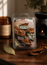 Clear clamshell labeled 'Tobacco & Bay Leaf' with brown dried tobacco leaves, a green bay leaf, amber jar and black wax warmer.
