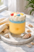 Tropical Sorbet Decorative Candles in a colorful dessert-style candle with whipped topping and decorative candies.