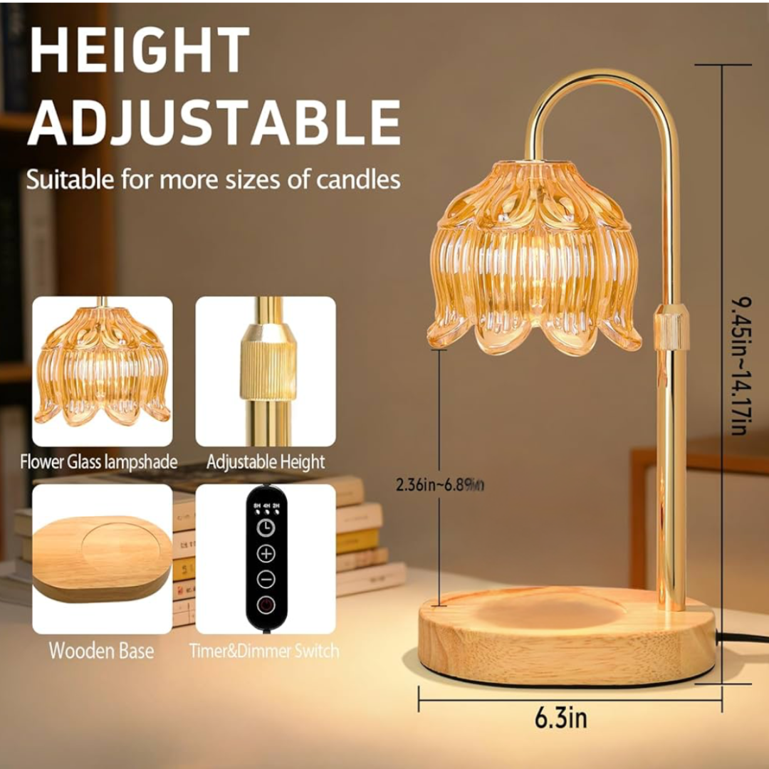 Gold arched lamp warmer with amber flower-shaped glass shade, round light-wood base with recessed candle dish and black timer/dimmer remote.