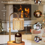 Gold-tone adjustable lamp warmer with diamond glass shade over base holding amber jar candle labeled 'Soli Deo Gloria'.