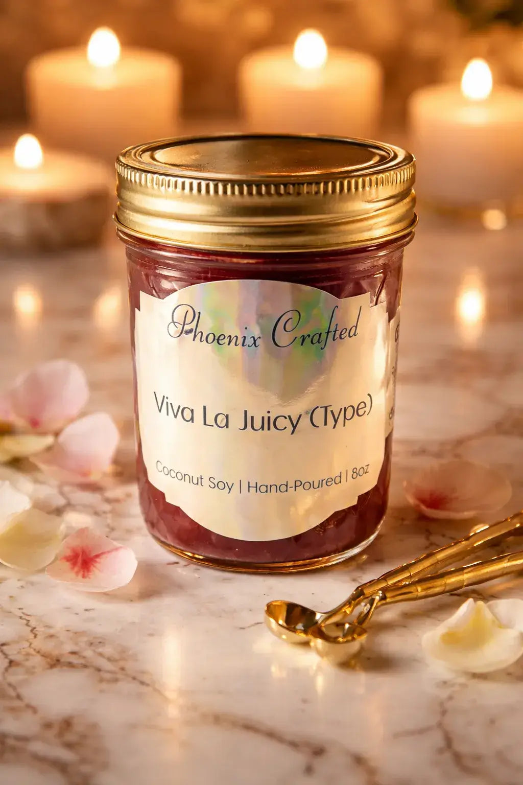 Viva La Juicy Candle in a hand-poured jar, featuring a vibrant label and surrounded by soft floral accents.