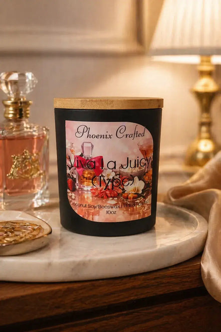 Viva La Juicy Candle displayed on a decorative table, surrounded by luxurious decor and soft lighting.