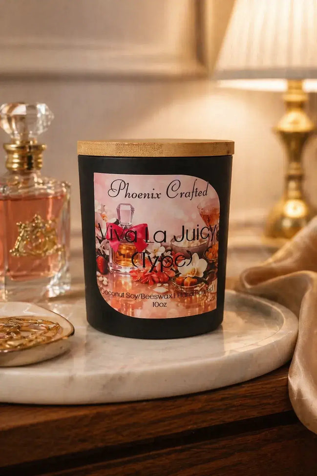 Viva La Juicy Candle displayed on a decorative table, surrounded by luxurious decor and soft lighting.