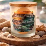 Wanderlust Waves Candle with wooden lid, displayed with seashells and stones on a coastal backdrop.