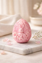 Bunny Egg Candle with a pink bunny design, decorated with flowers, perfect for Easter and spring decor.