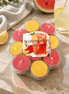 Pack of Watermelon Lemonade tealights showing vibrant colors that evoke summer vibes and fruity scents.