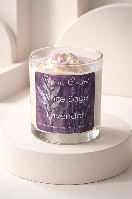 White Sage & Lavender Candle in a glass jar on a pedestal with decorative label and lavender top.