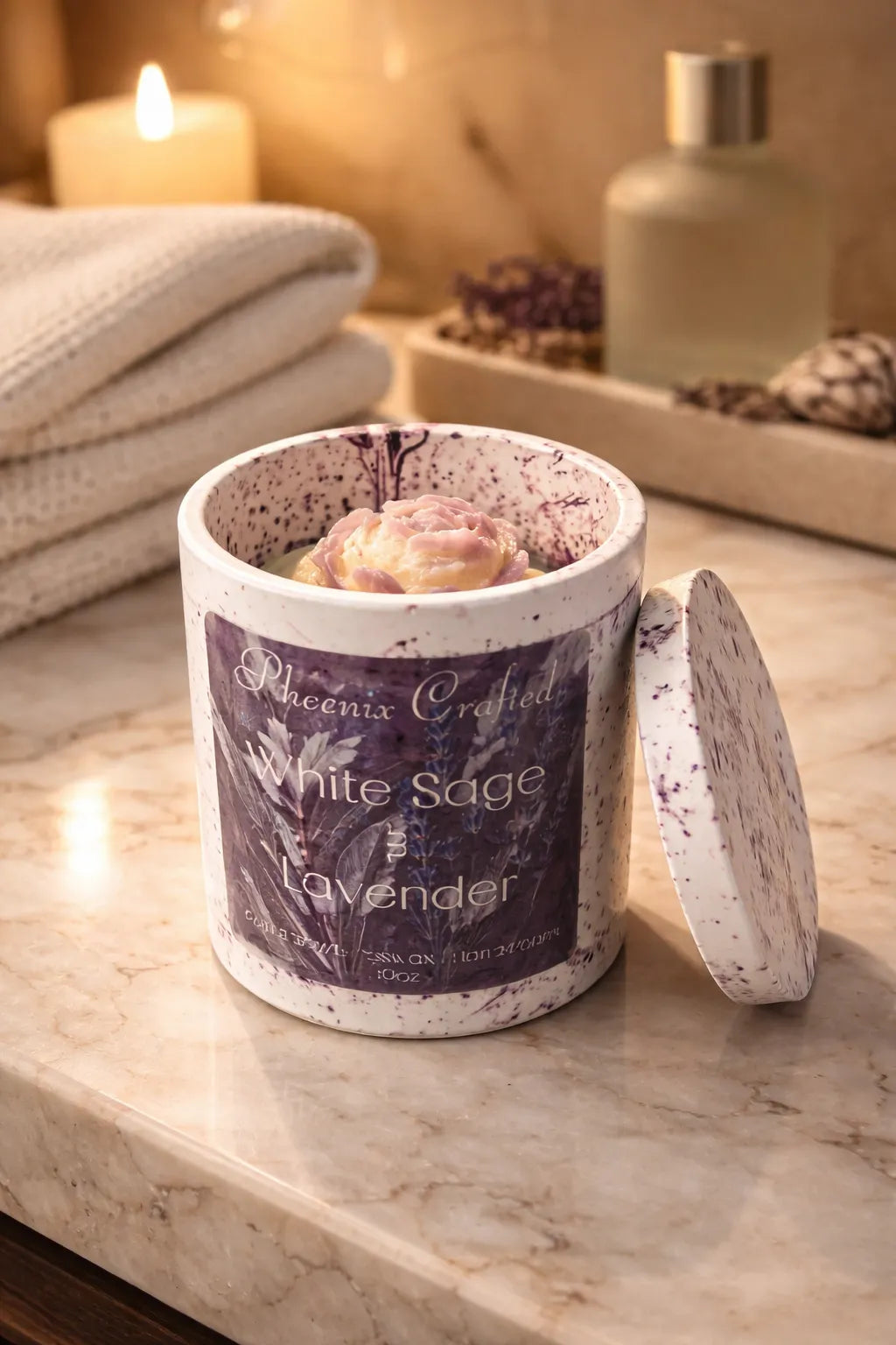 White Sage & Lavender Candle in a container on a marble surface, perfect for creating calming spaces.
