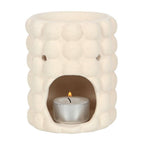 Cream speckle bubble tealight wax warmer with a trendy bubble design and a candle inside.