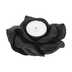 Black rose tealight candle holder made of resin, elegantly designed to create a romantic ambience.