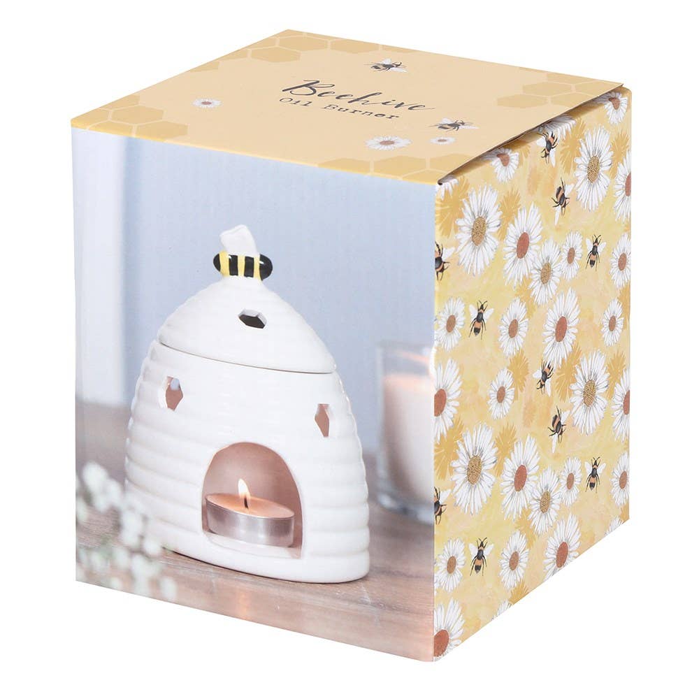 White Beehive Tealight Wax Warmer in decorative packaging with a sweet bee design.