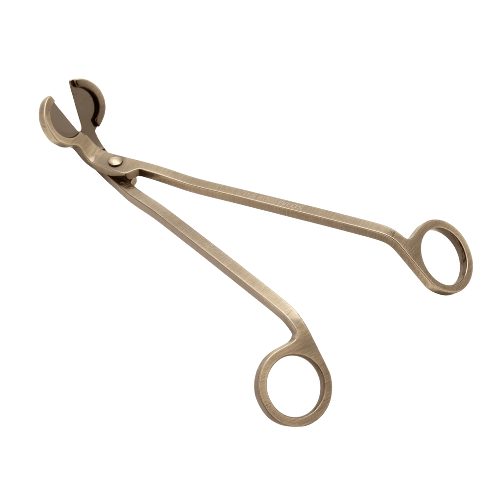 brass candle wick trimmer designed for trimming candle wicks to improve burning and reduce soot.