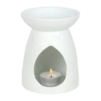 White Ceramic Constellation Tealight Wax Warmer with tealight candle for fragrance infusion.