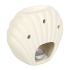 Seashell oil burner for home decor, featuring a neutral stone finish and candle holder, ideal for releasing delightful summer scents.