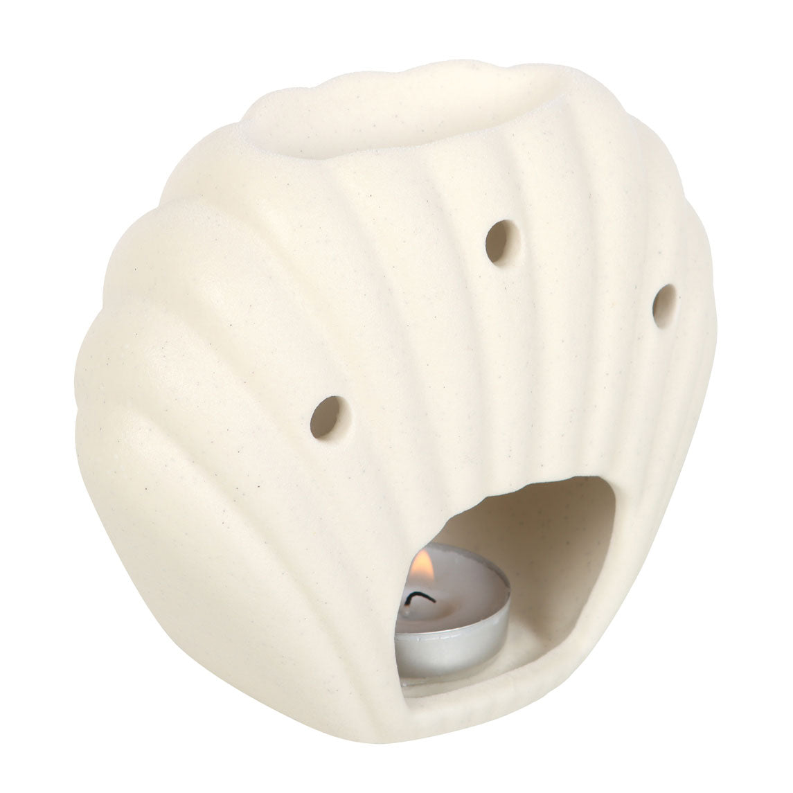 Cream speckled ceramic seashell-shaped wax warmer with scalloped ridges, three round vent holes, top bowl and front cavity holding a lit tealight