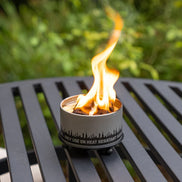 Wrought-iron trivet and candle holder styled for compatible candles or portable mini fire pits.